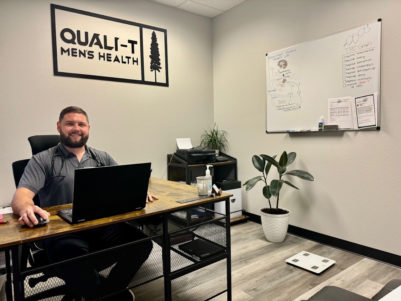 Nurse Practitioner Chris Mckeown at his desk