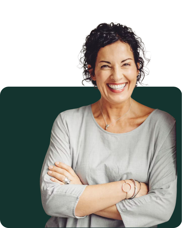 Woman with folded arms smiling