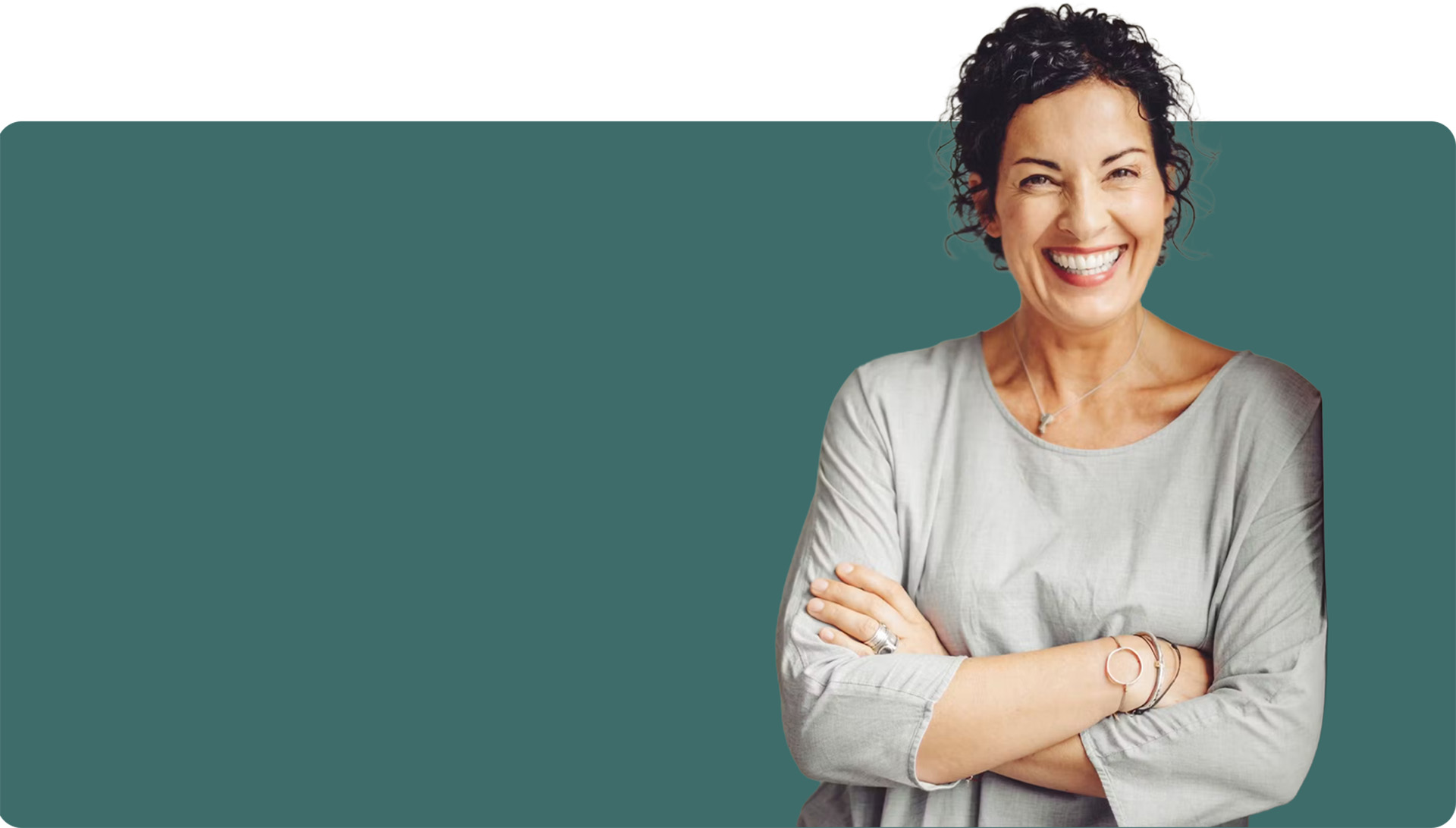 Woman with folded arms smiling